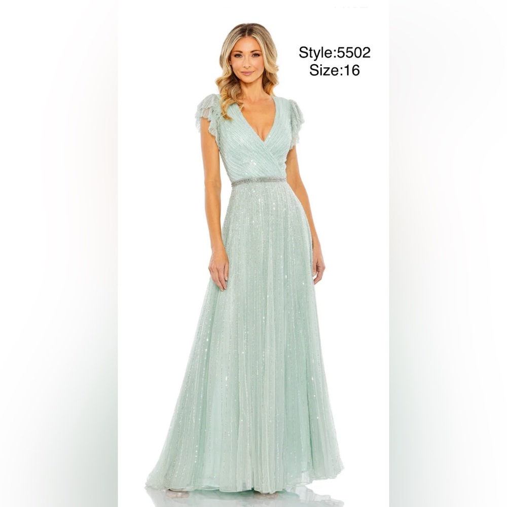 Sequined wrap over ruffled cap sleeve gown